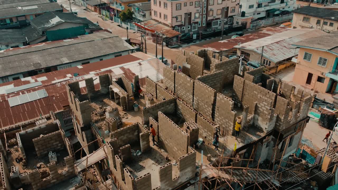 Construction team working on a concrete building frame in Lagos